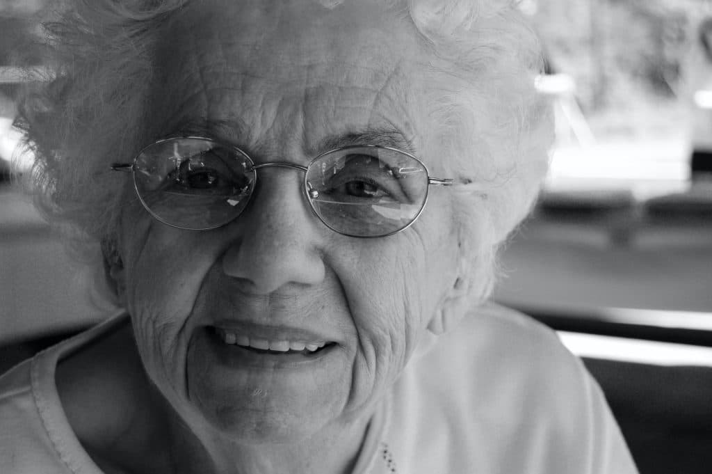 Senior in Deerfield Beach, FL showing her healthy teeth
