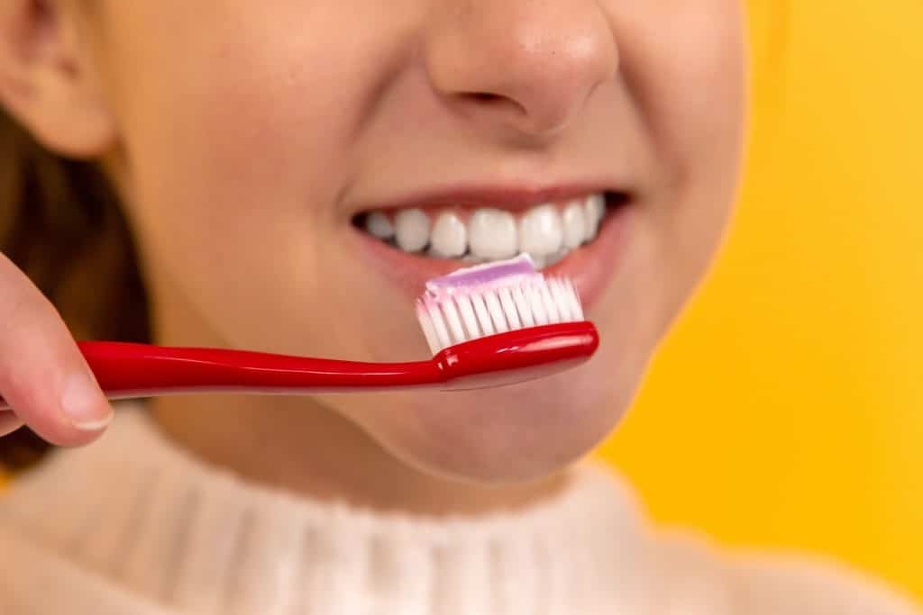 Girl with a new toothbrush