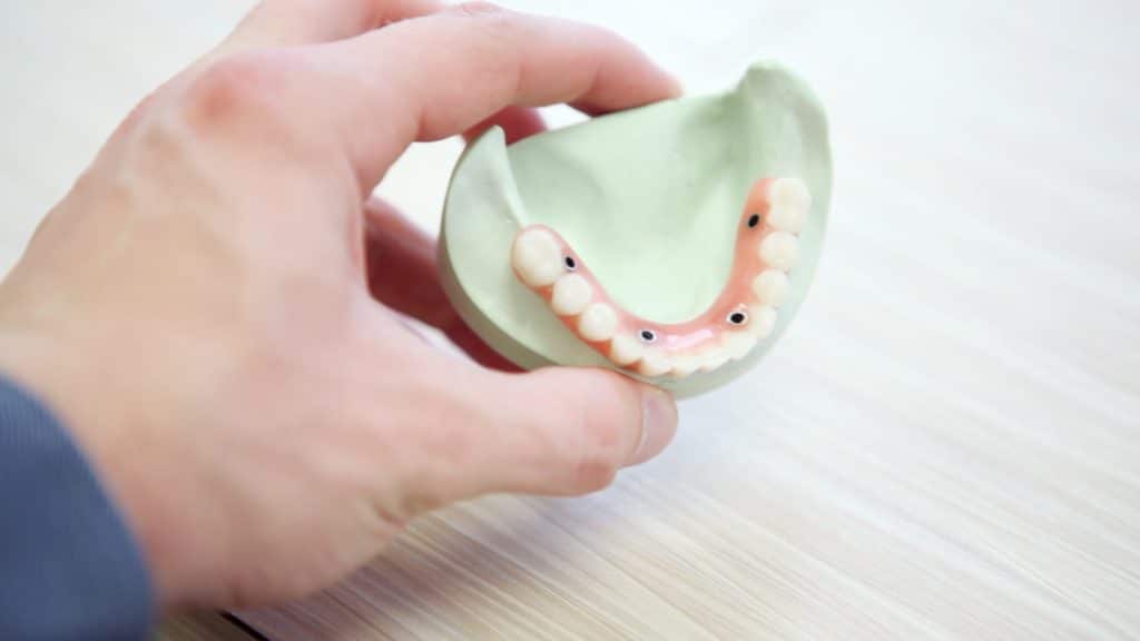 Dentist checking on a patient