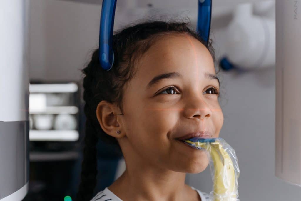 young athlete getting a dental checkup