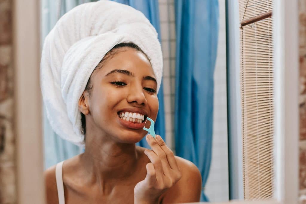 woman flossing