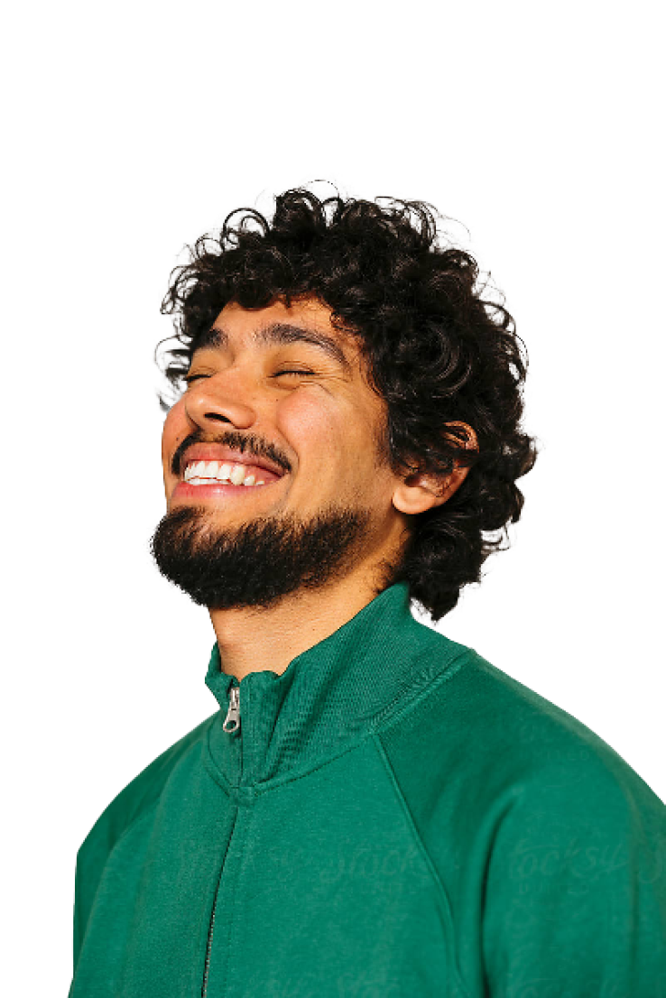 man with green shirt and smiling