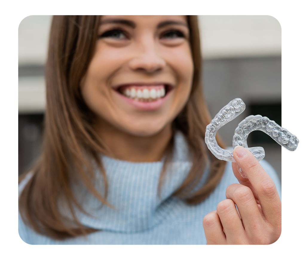 smiling girl with aligner